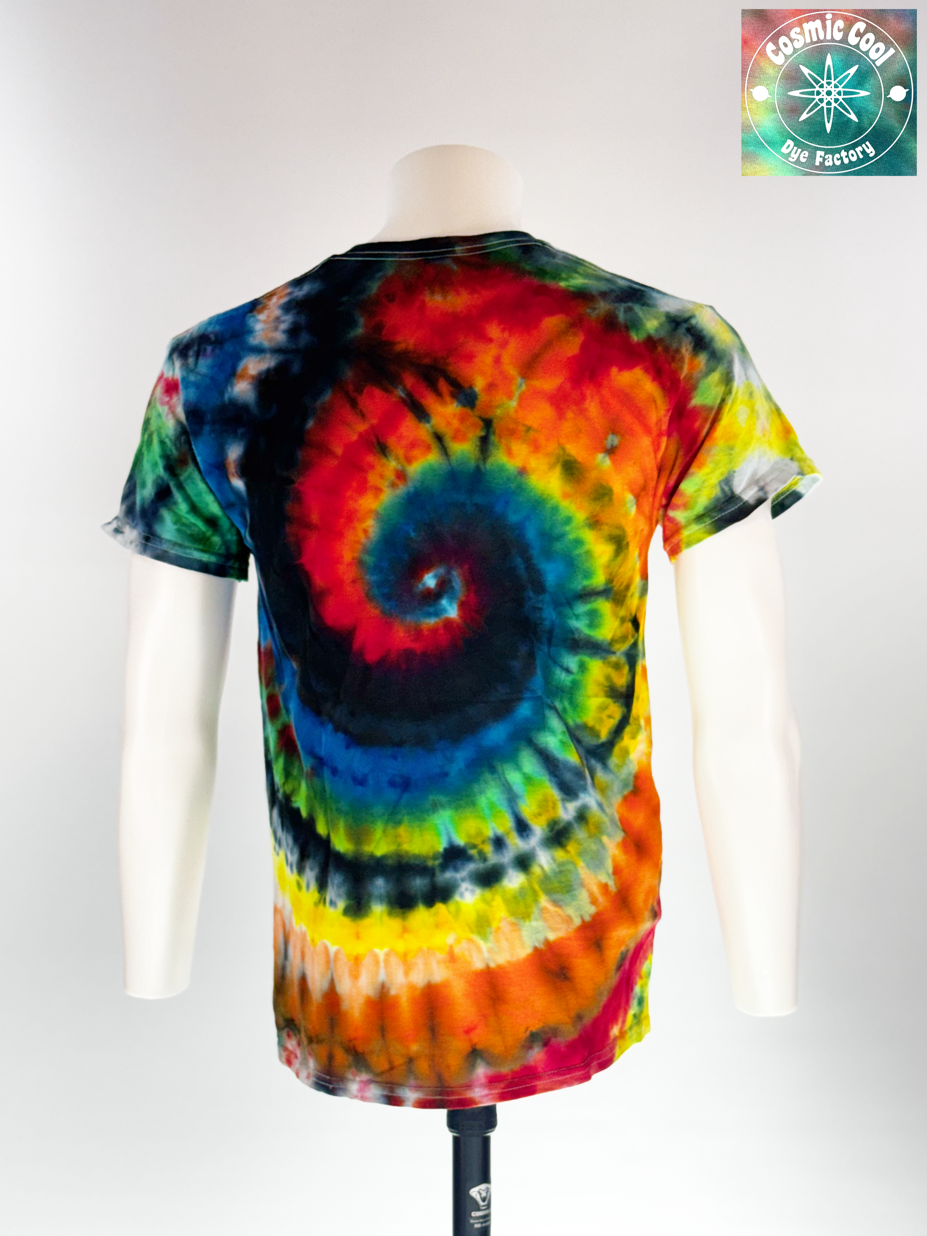 Back view of Medium Short sleeve artisan tee. Event Horizon features a high-saturation, multi-color spiral that creates a sense of powerful gravity. Intense crimsons, neon yellows, and electric blues are pulled into a deep indigo and obsidian core, mimicking the edge of a celestial phenomenon.