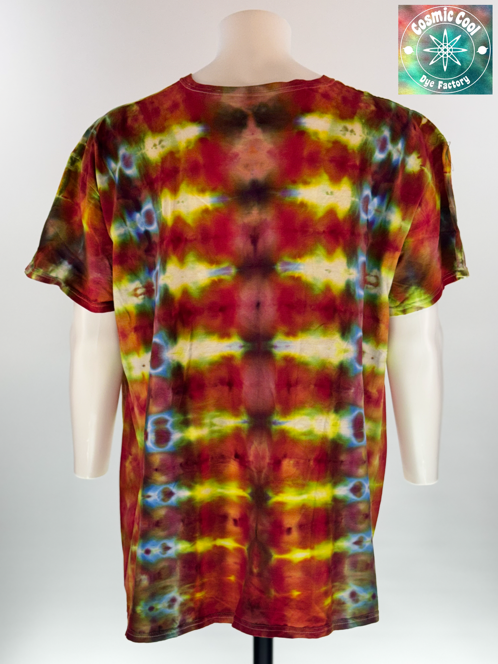 Back View of 3XL Short sleeve Artisan Tee. "Celestial Pillar" is defined by a central, vertical axis of crystalline white and silver, flanked by deep atmospheric blues and violet shadows. Using a specialized techniques, we’ve created a mirrored "pillar" effect that elongates the crystalline details of the ice-dye.