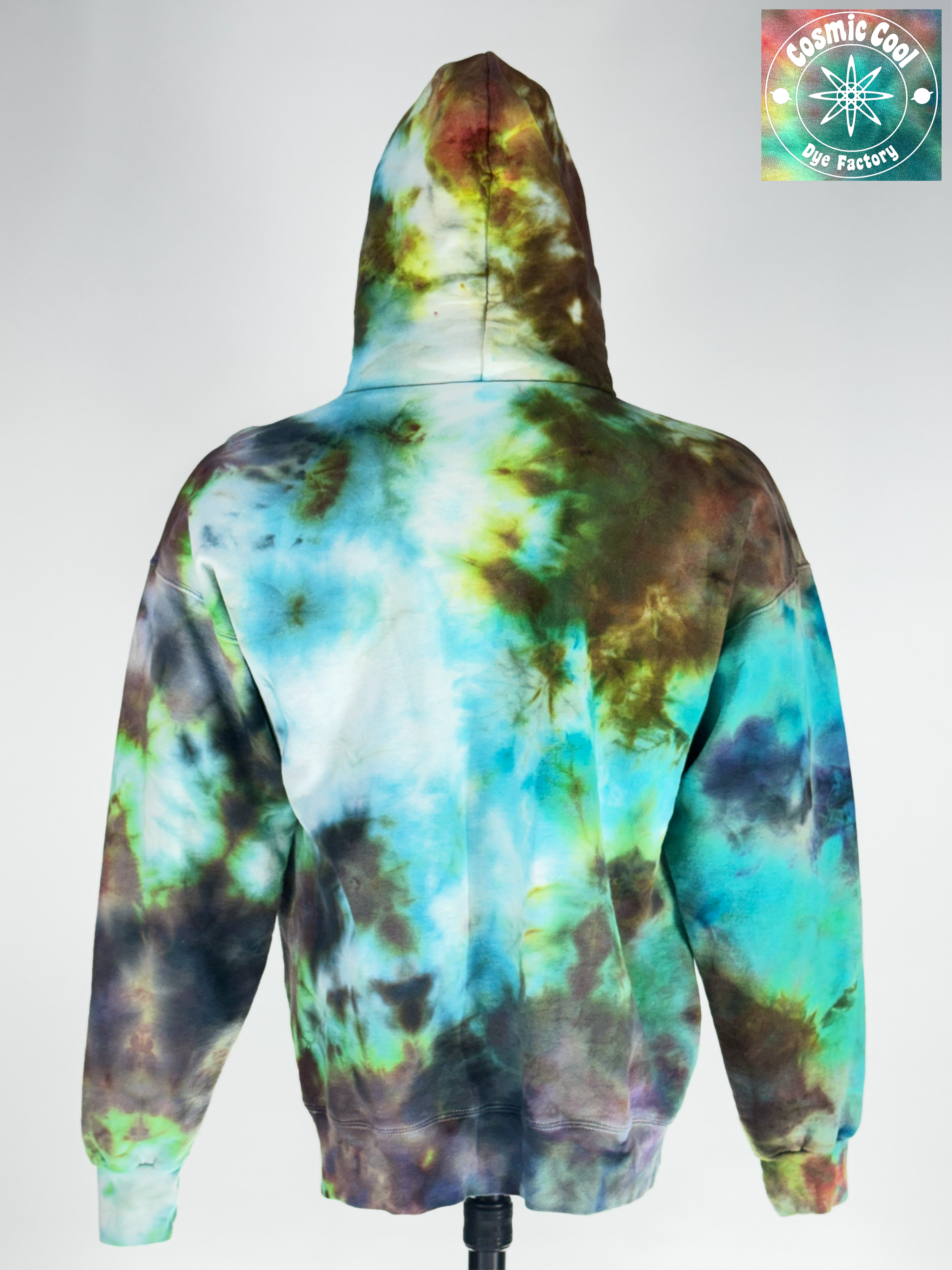 Back view of large Heavyweight hoodie. "Stellar Overcast" features an extended crystallization allow pigments to fracture into unique, high-detail patterns that mimic a sky on the verge of a celestial event.