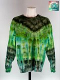 Front view of a 3XL Long Sleeve Ice Dye T-shirt. The design features a dark green crystalline patterns radiating across a luminescent field of emerald green.