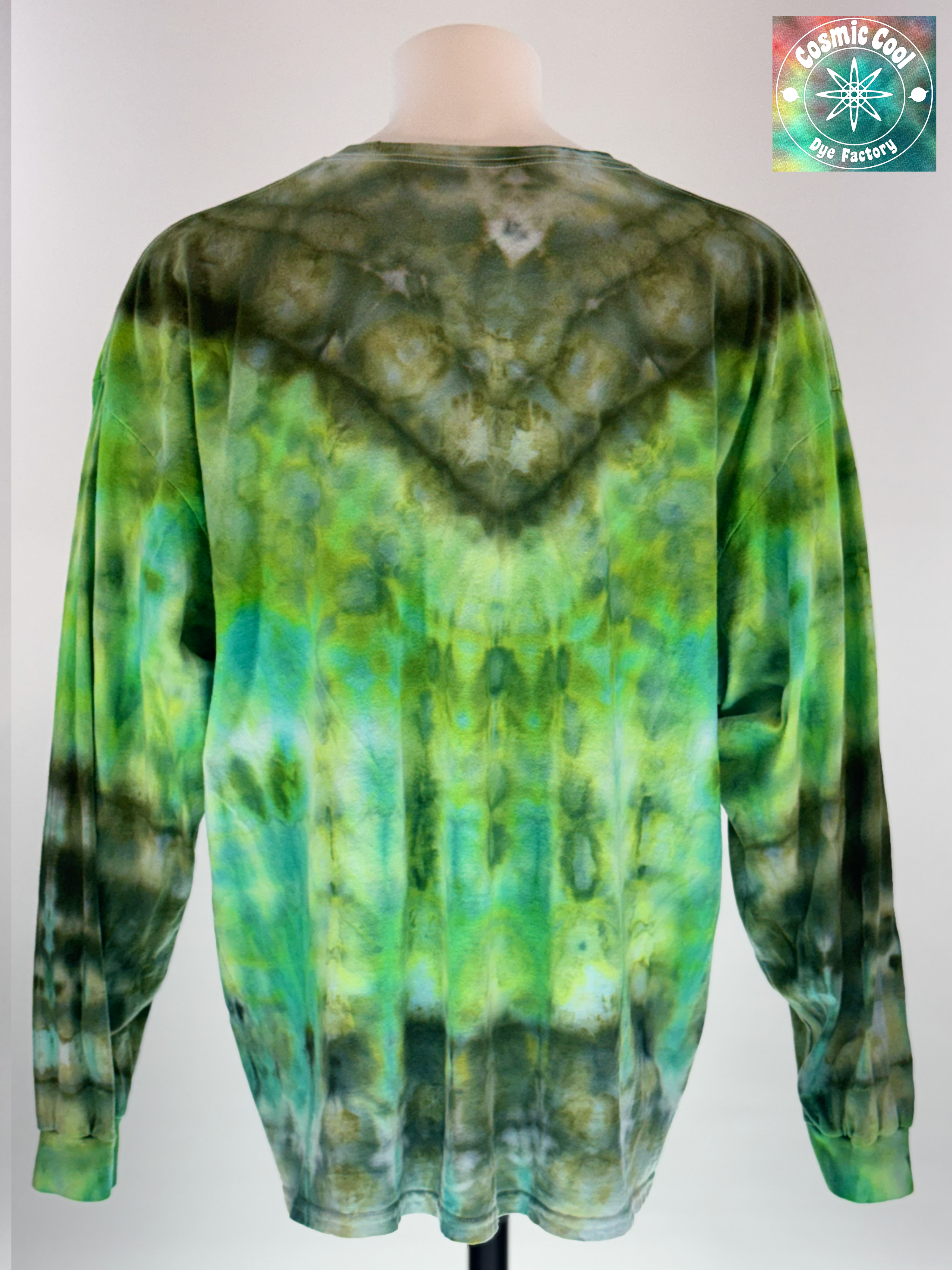 Back view of a 3XL Long Sleeve Ice Dye T-shirt. The design features a dark green crystalline patterns radiating across a luminescent field of emerald green.