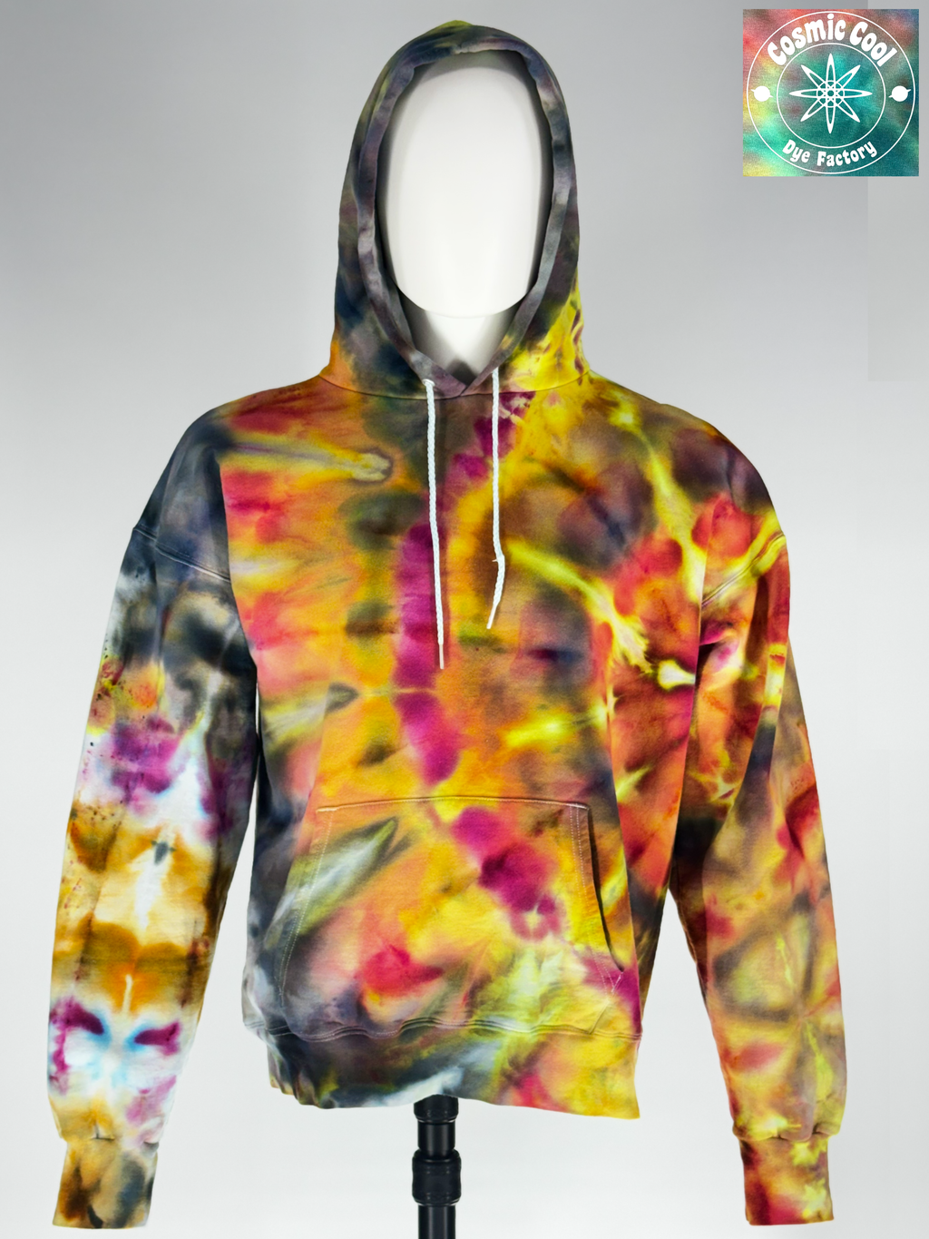 Front view view on a mannequin of our Large heavyweight hoodie, Supernova Yellowstar" captures the explosive energy of a collapsing star. The crystalline patterns imprints intense solar yellows and brilliant golds fracture through deep space-shadows. The result is a vibrant, "glowing" effect that feels radiant even in low light.