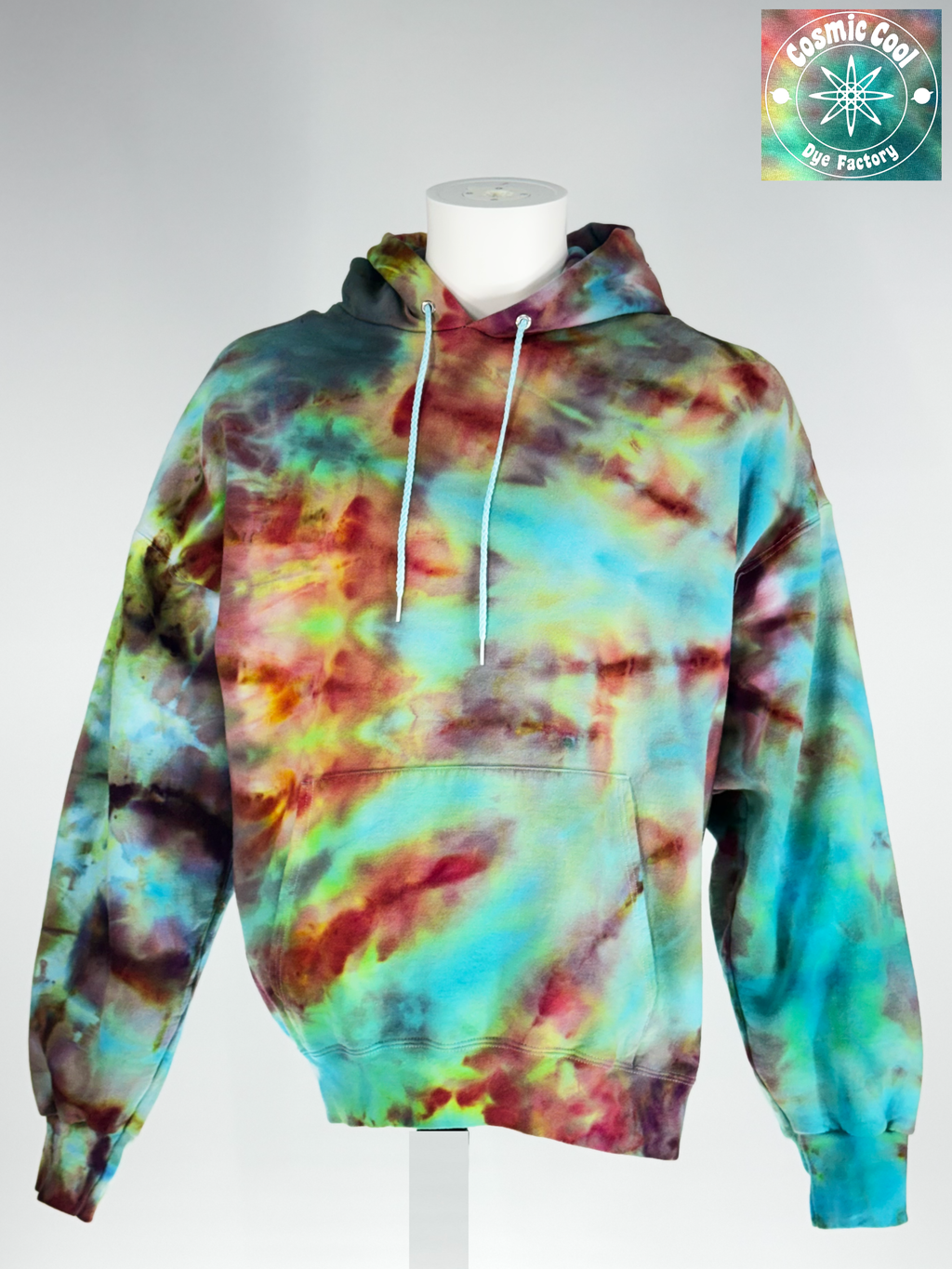 Front view on a mannequin with no head of a 2XL Ice-dyed Heavyweight Hoodie.The Vision: "Bioluminescent Void" explores the intersection of total darkness and organic light. The pigments seem to fracture out to a deep obsidian base, with "glowing" crystalline structures in neon-adjacent violets and electric teals. 