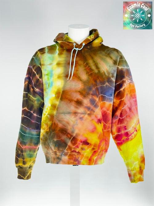 Front View of our XL Heavy Weight Hoodie. "Chronos Drift" captures the slow, inevitable movement of time. Pigments are allowed to drift and settle into intricate crystalline patterns, creating a shifting landscape of color that appears to evolve as you move.