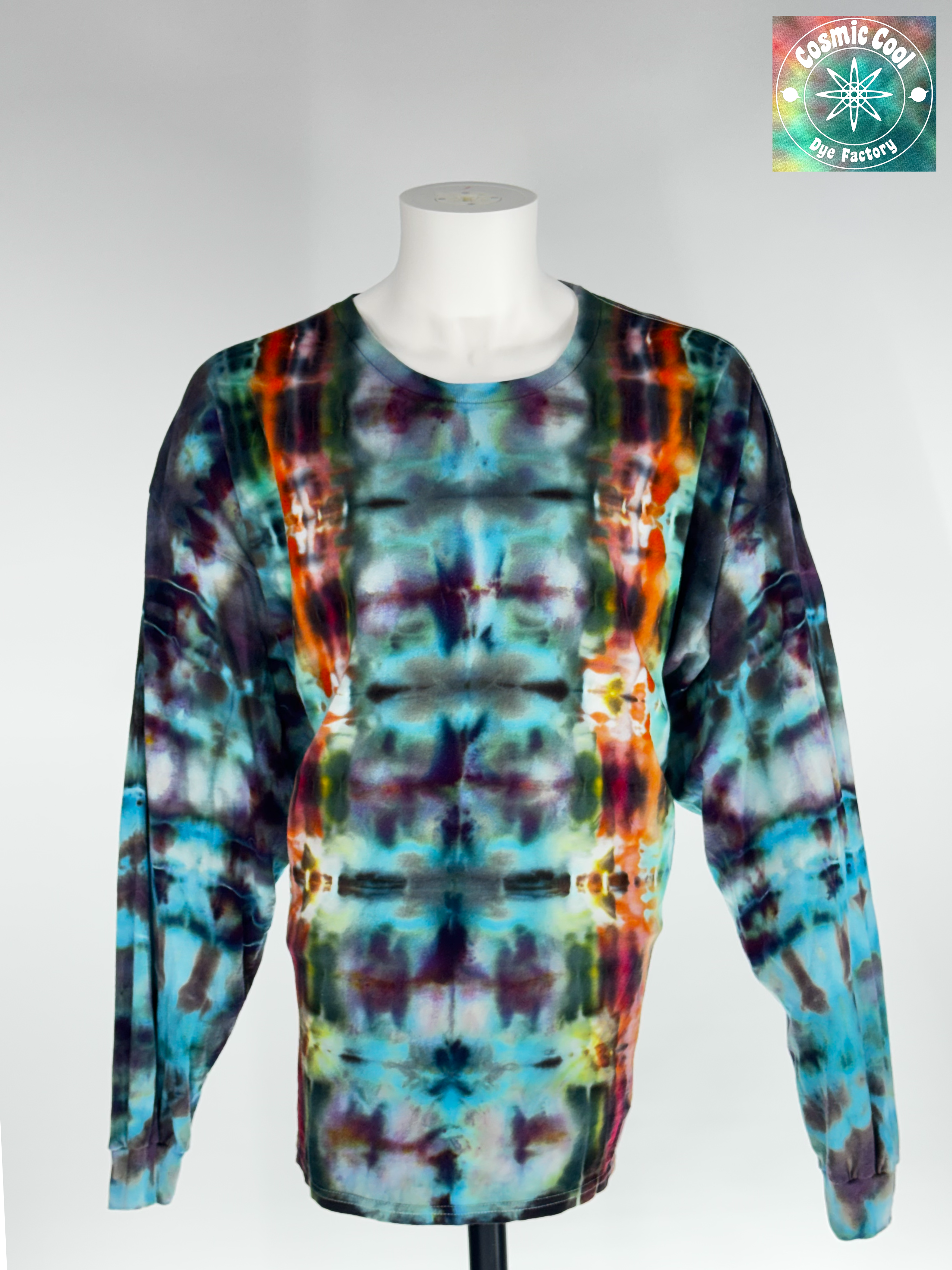 Front view of a 3XL long-sleeve ice dye T-shirt featuring the 'Solar Alchemist' design. Intricate, crystalline ice dye patterns in deep amber and burnt orange radiate across a bright, golden-yellow field, creating a high-energy, sun-like quality