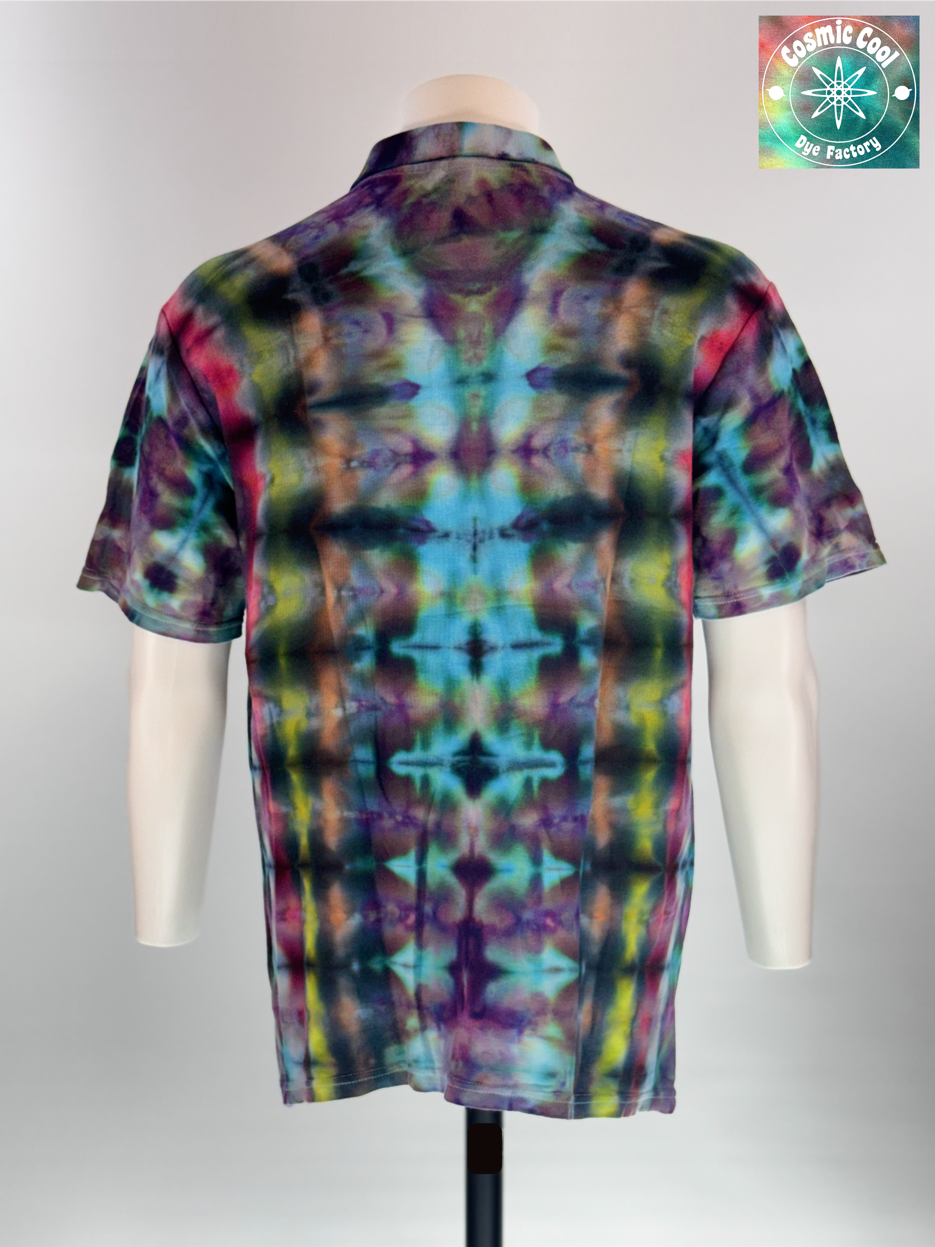 Back view of XL Ice Dye woven Polo. "Eclipse Alchemist" features a central vertical alignment of mirrored "lunar events," with deep violets and teals transitioning into sudden, alchemical bursts of sulfur-yellow and magenta. 