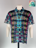 Front view of XL Ice Dye woven Polo. "Eclipse Alchemist" features a central vertical alignment of mirrored "lunar events," with deep violets and teals transitioning into sudden, alchemical bursts of sulfur-yellow and magenta. 