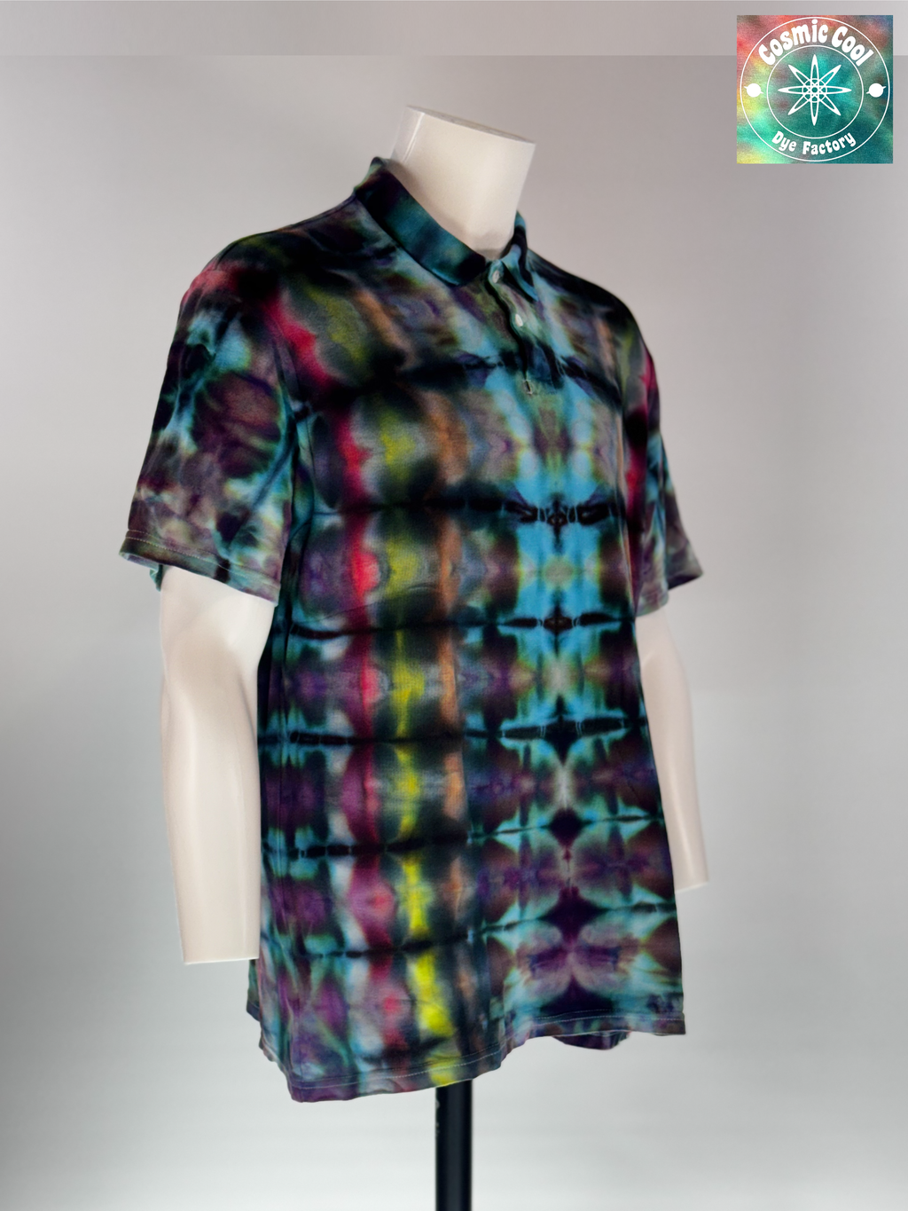 Angled 3/4 Front view of XL Ice Dye woven Polo. "Eclipse Alchemist" features a central vertical alignment of mirrored "lunar events," with deep violets and teals transitioning into sudden, alchemical bursts of sulfur-yellow and magenta. 