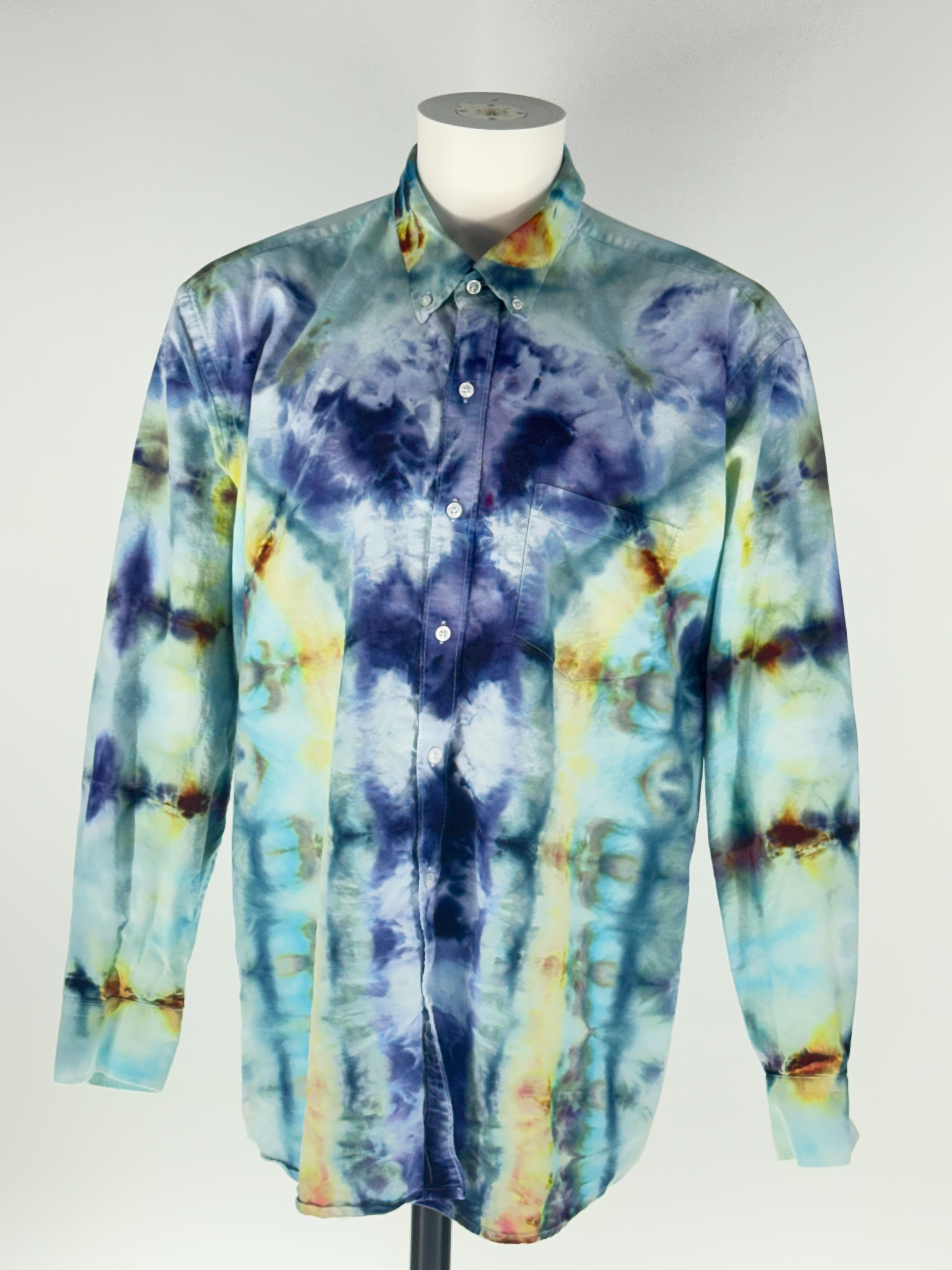 The Wake of the Proxima Centauri: 2XL Cosmic Ice-Dyed Oxford