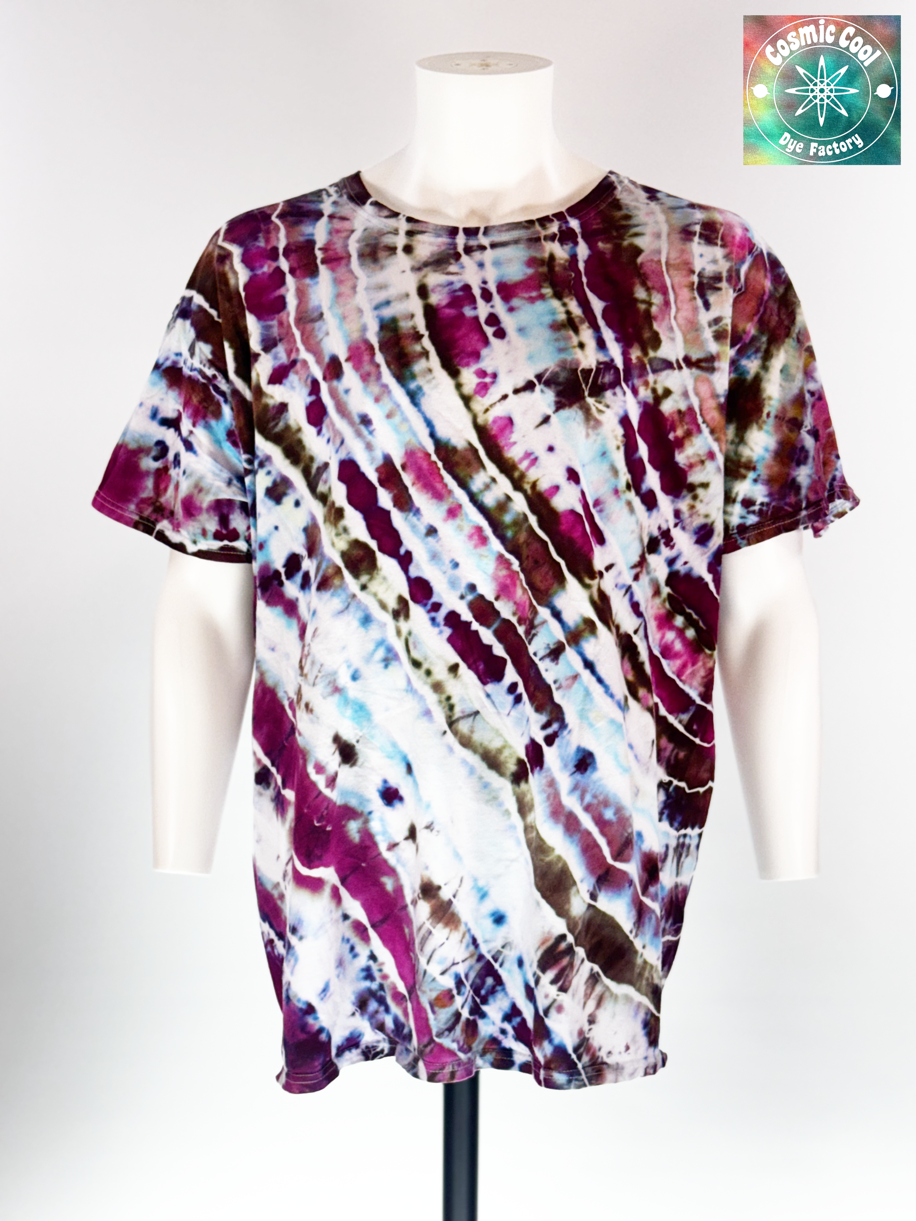 Video of spinning 3XL Short Sleeve Artisan Tee. Titan's Reach features a powerful, dream-like quality. Imagine deep charcoal and slate "stone" textures being shattered by veins of molten gold and cooling embers. Creating a sense of tactile depth, as if the color is physically emerging from the rock itself.